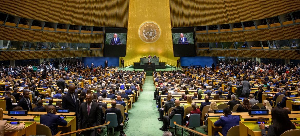 UN Secretary-General António Guterres (on screen) addresses the opening of the General Debate of the General Assembly’s 80th Session.