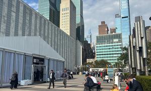 Delegates gather outside the SDG Media Zone on the UN campus.