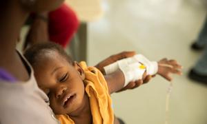 A young child is treated for cholera at a hospital in Port-au-Prince, Haiti.