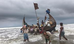 Rohingya refugees walk ashore after traveling by boat from Myanmar on the Bay of Bengal to Cox's Bazar in Bangladesh. (file)