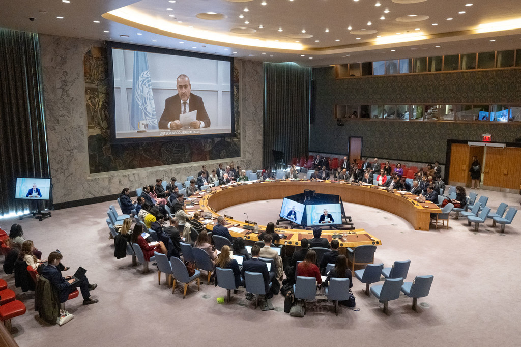 A wide view of the Security Council meeting on the situation in the Middle East, including the Palestinian question. UN Resident and Humanitarian Coordinator Ramiz Alakbarov (on screen) briefs members. A wide view of the Security Council meeting on the situation in the Middle East, including the Palestinian question. UN Resident and Humanitarian Coordinator Ramiz Alakbarov (on screen) briefs members.