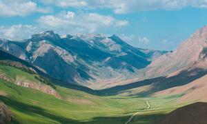 Kyrgyzstan is a mountainous country in Central Asia. It shares borders with China, Kazakhstan, Tajikistan, and Uzbekistan and has no direct access to the sea.
