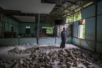 In Mandalay, a teacher stands amid the ruins of the classroom where he once taught English and Science – now destroyed by the March earthquakes.