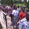 People crossing over a newly constructed bridge in Tambura, South Sudan, funded by the UN Mission in the country, UNMISS.