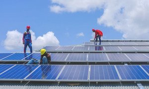 As part of a UNDP-led green renovation project, technicians install solar panels at a police academy in Rajaf, South Sudan. (21 August 2018)