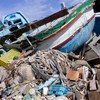 (من الأرشيف) مقبرة القوارب في لامبيدوزا حيث يتم تخزين القوارب التي استخدمت من قبل المهاجرون من أجل تدميرها فيما بعد.