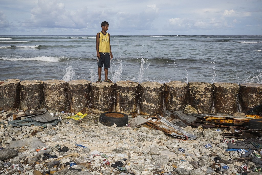 Even with a seawall, high tides flood the yard of this 13-year-old’s home in Majuro Atoll, Marshall Islands.