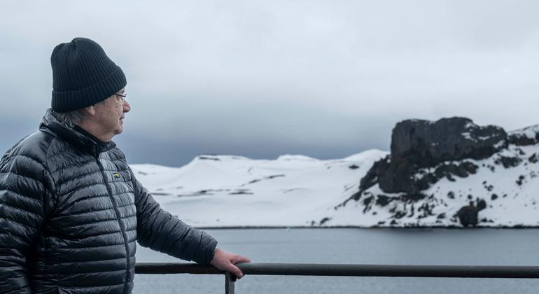 UN Secretary-General António Guterres looks across the ice sheet at Frei Antarctica base.
