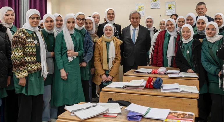 UN Secretary-General António Guterres (centre) meets students at an UNWRA school in Amman, Jordan.