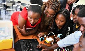 Girls attend a robotics bootcamp in Rwanda.