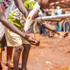 Refugees who have fled violence in DR Congo to Burundi use a water point at a refugee camp in Cibitoke Province.