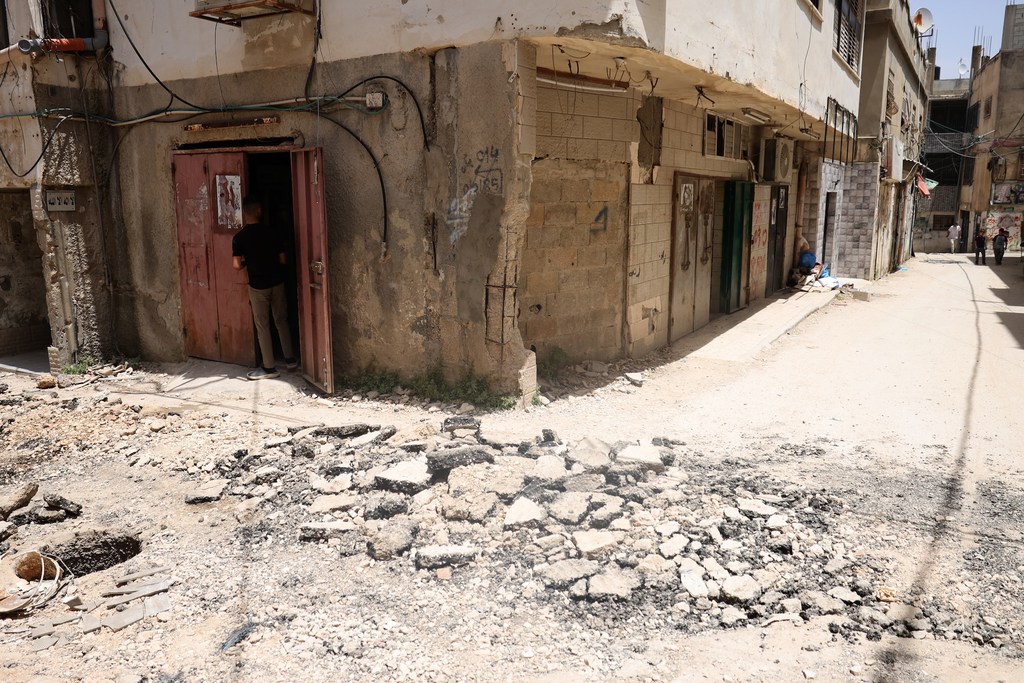 أضرار في الطرق والمباني والبنية التحتية نتيجة التصعيد في جنين بالضفة الغربية المحتلة في حزيران/يونيو.