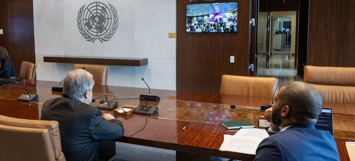 Secretary-General Guterres (left) addresses Amnesty International’s Global Assembly via video link.