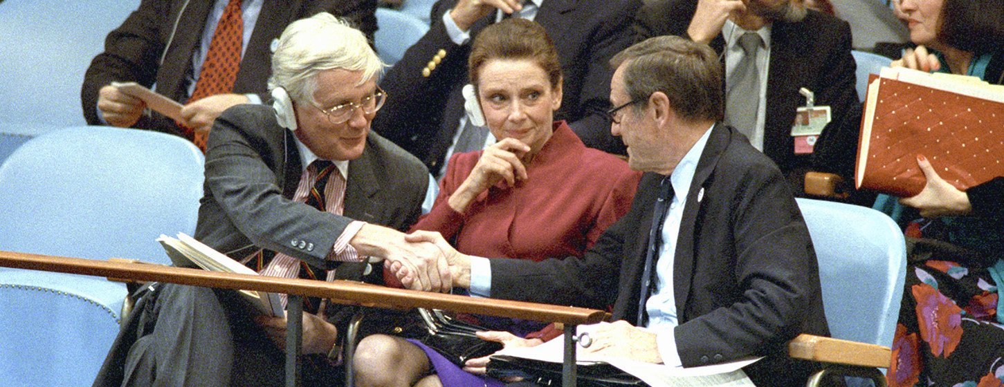 In 1989, the UN General Assembly adopted a Convention on the Rights of the Child without a vote. Seated from left to right are Under-Secretary-General for Human Rights Jan Martenson, UNICEF Goodwill Ambassador Audrey Hepburn and UNICEF chief James Grant.