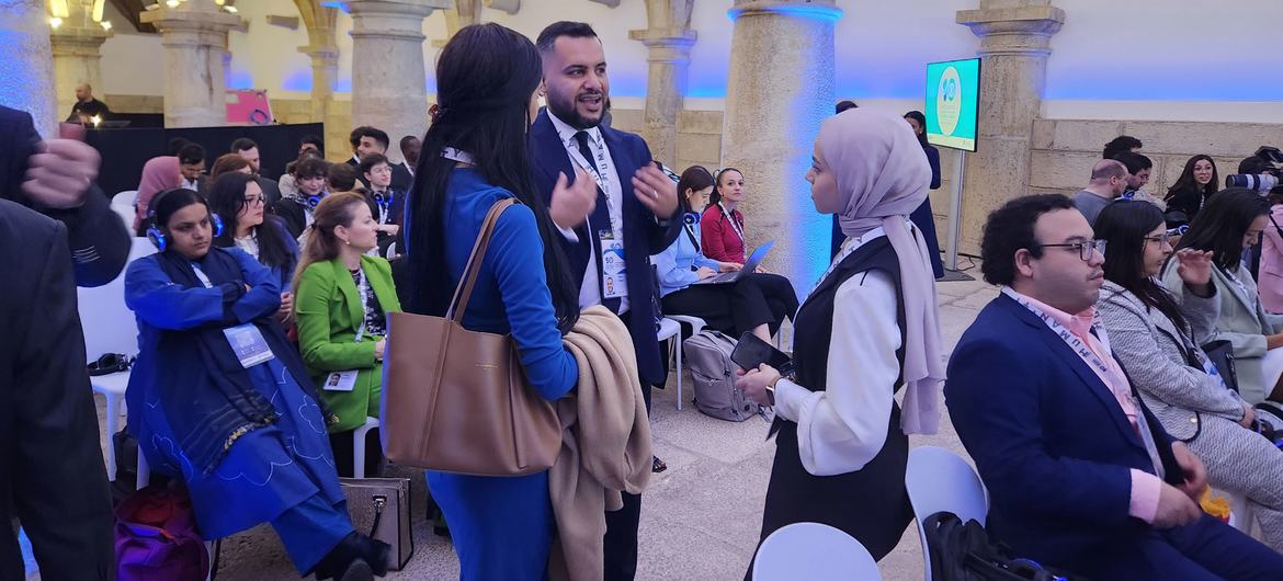 Youth Forum participants get ready for the opening session in Cascais, Portugal.