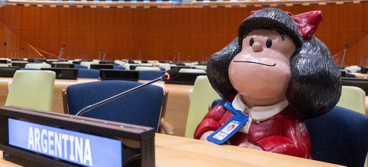 Argentine cartoon character Mafalda sits in at her country's assigned seat during her visit to the United Nations.