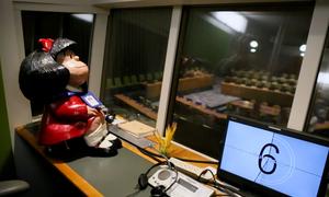 Argentine cartoon character Mafalda visits the interior of a United Nations interpretation booth.