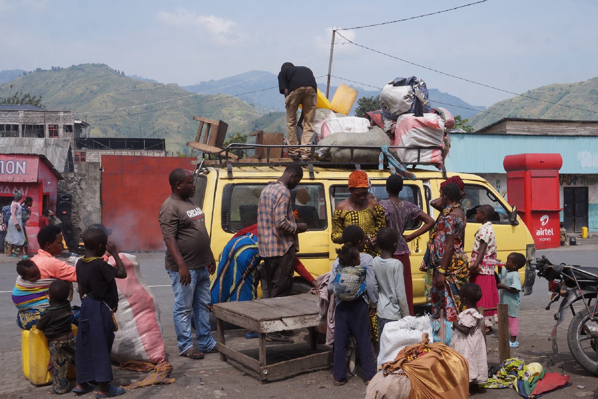 Civilians try to return home to Sake in the DR Congo, after fleeing an assault by M23 rebels.