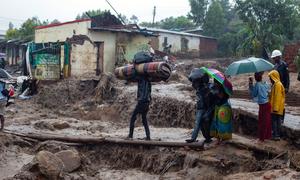 People flee their homes as Cyclone Freddy hits Blantyre city in Malawi.