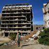 Разрушенные здания во многих городах Ливии  –  трагическое напоминание о годах вооруженных столкновений в стране. На фото  –  город Бенгази.