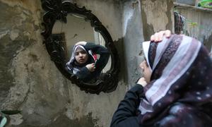 A 15-year-old girl at home in the Gaza Strip.