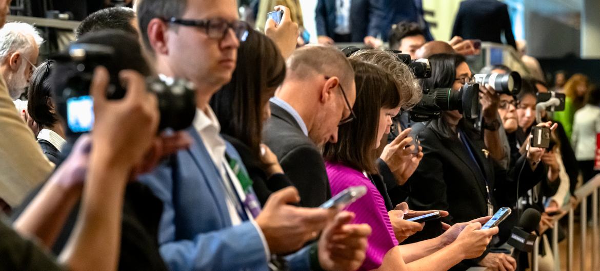 Journalists wait for a world leader's stakeout at UN Headquarters.