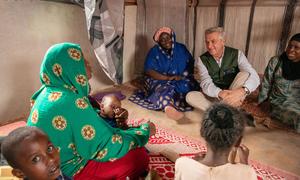 UN High Commissioner for Refugees, Filippo Grandi, interacts with an internally displaced family in South Galkayo in Somalia.
