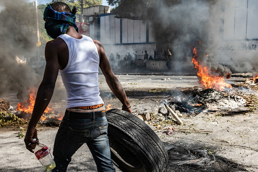 People are protesting on the streets of  Port-au-Prince in crisis-torn Haiti.