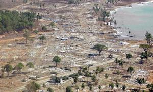 An aerial view of the utter devastation of the Indonesian coast, between the towns of Banda Aceh and Meulaboh. Photograph taken one week after the 2004 Indian Ocean tsunami.