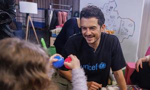 UNICEF Goodwill Ambassador Orlando Bloom plays with children in the UNICEF Spilno Child Spot at a metro station in Kyiv, Ukraine on 25 March 2023.