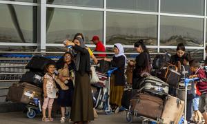 Yazidi survivor families prepare for resettlement to France, marking a new chapter of safety and dignity.