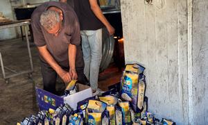 Gaza community kitchens provide essential hot meals to Palestinians affected by the humanitarian crisis.