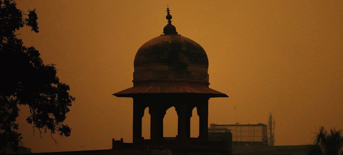 The dome of a Mosque in Pakistan as the sun rises.