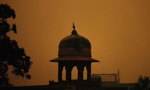 The dome of a Mosque in Pakistan as the sun rises.