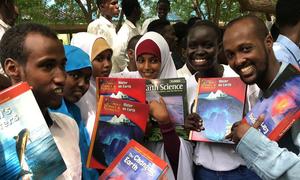 Abdullahi Mire (far right) is supporting education initiatives in Dadaab refugee complex in northeastern Kenya.