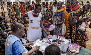 Health workers attend to pregnant and breastfeeding mothers at an outreach visit supported by UNFPA in Loima Sub-county.