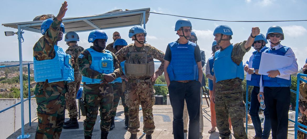 Jean-Pierre Lacroix (centre right), Under-Secretary-General for Peace Operations, talks to peacekeepers deployed to the UN mission in Lebanon, UNIFIL.