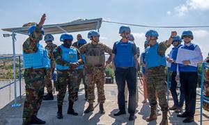 Jean-Pierre Lacroix (centre right), Under-Secretary-General for Peace Operations, talks to peacekeepers deployed to the UN mission in Lebanon, UNIFIL.