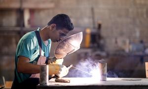 A young unemployed man receives job training in Lebanon. 
