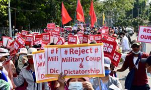 Protesters attend a march against the military coup in Myanmar.