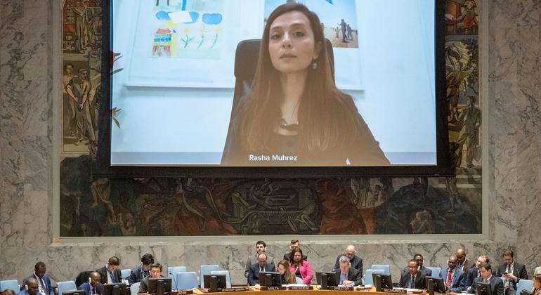 Rasha Muhrez (on screen), Response Director at Save the Children, briefs the Security Council meeting on the situation in Syria.
