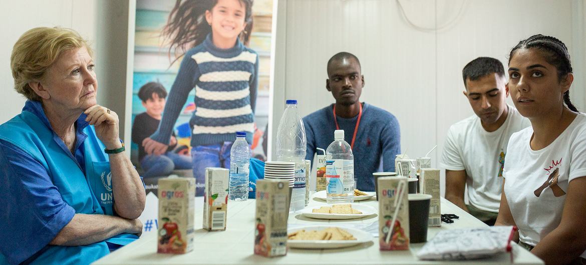 UNHCR Assistant High Commissioner for Protection Gillian Triggs (left) meets a group of asylum seekers on Samos island, Greece.