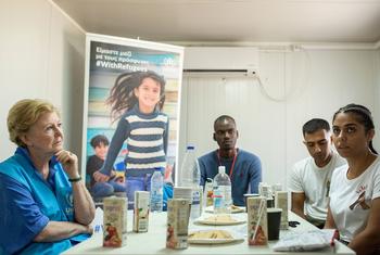 UNHCR Assistant High Commissioner for Protection Gillian Triggs (left) meets a group of asylum seekers on Samos island, Greece.
