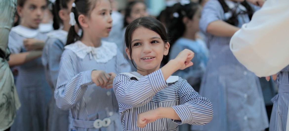 Palestinian children go back to school across the Gaza Strip.