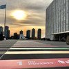 The sun rises over the SDGs path at the entrance to the UN General Assembly building in New York.