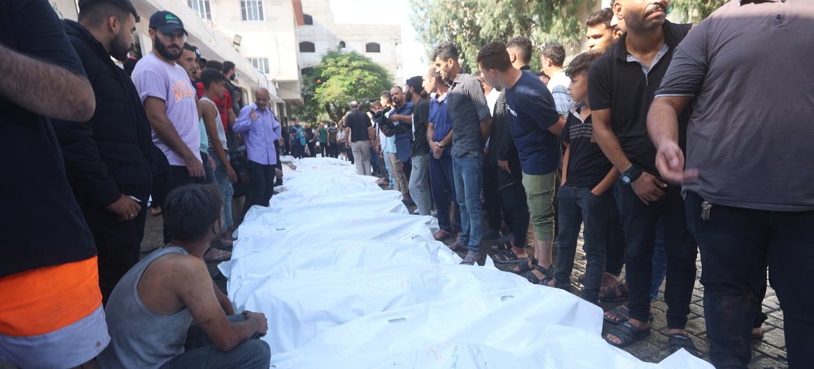 Mourners attend the funeral of people who died following Israeli strikes in Gaza.