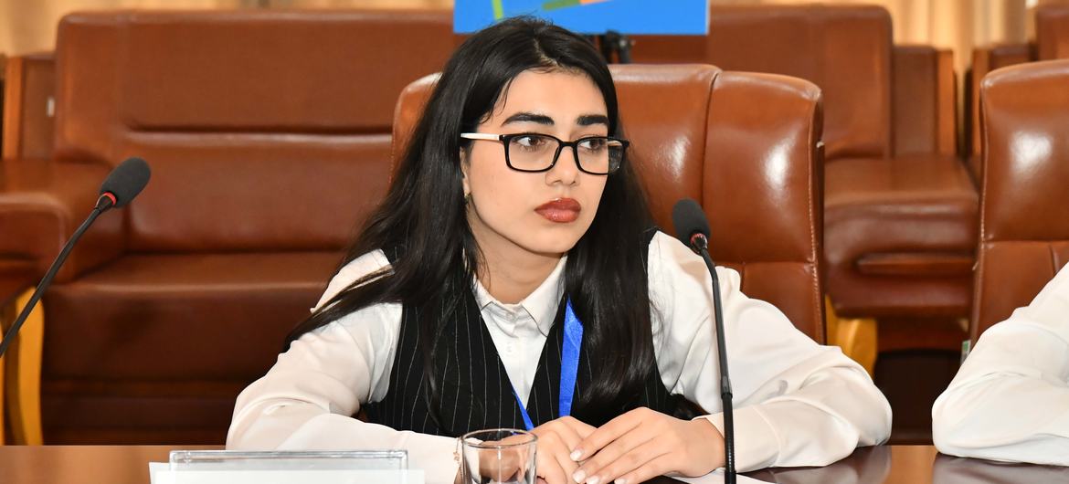 Fariza Dzhobirova, a young climate activist from Tajikistan, represents Switzerland at a Model United Nations conference on glacier preservation. Fariza Dzhobirova, a young climate activist from Tajikistan, represents Switzerland at a Model United Nations conference on glacier preservation.