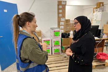 Louise Wateridge of UNRWA (left) speaking with Dr. Sulafa who works with the Agency in Rafah, southern Gaza.