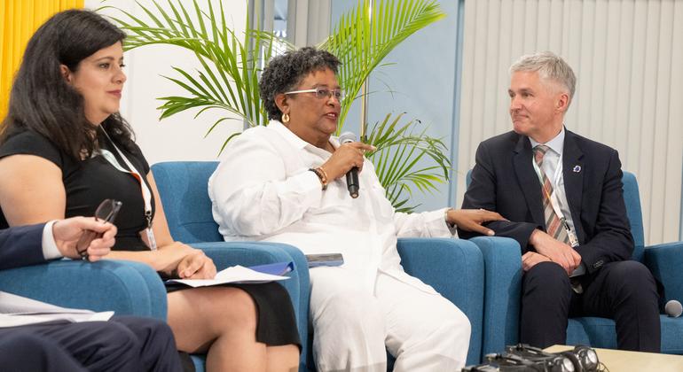 Prime Minister Mia Mottley (centre) of Barbados addresses the high-level meeting on mobilization of resources at the fourth International Conference on Small Island Developing States (SIDS4).