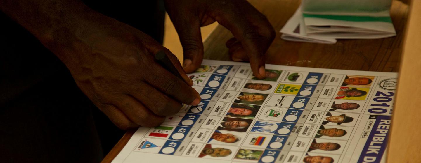 A man votes in elections in Haiti in 2010. (file)